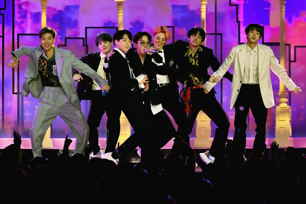 BTS, seen here performing during the 2019 Billboard Music Awards, were shut out of the 2020 Grammy nominations. But their loyal fans, called the Army, say the band's impact is measured in much more than awards.