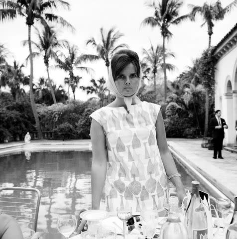 <p>Slim Aarons/Getty Images</p> Lilly Pulitzer in a shift dress