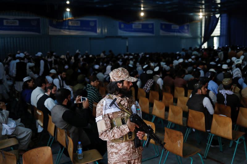 Taliban soldier stands guard at the second-anniversary ceremony of the takeover of Kabul by the Taliban in Kabul