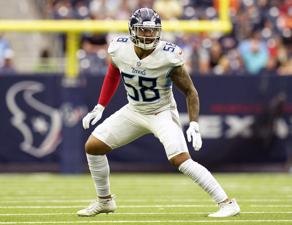 FILE - Tennessee Titans linebacker Harold Landry III drops in coverage during an NFL football game against the Houston Texans, Sunday, Jan. 9, 2022, in Houston. A person with direct knowledge of the decision told The Associated Press that Landry tore an ACL at practice Wednesday, Aug. 31, 2022. (AP Photo/Matt Patterson, File)