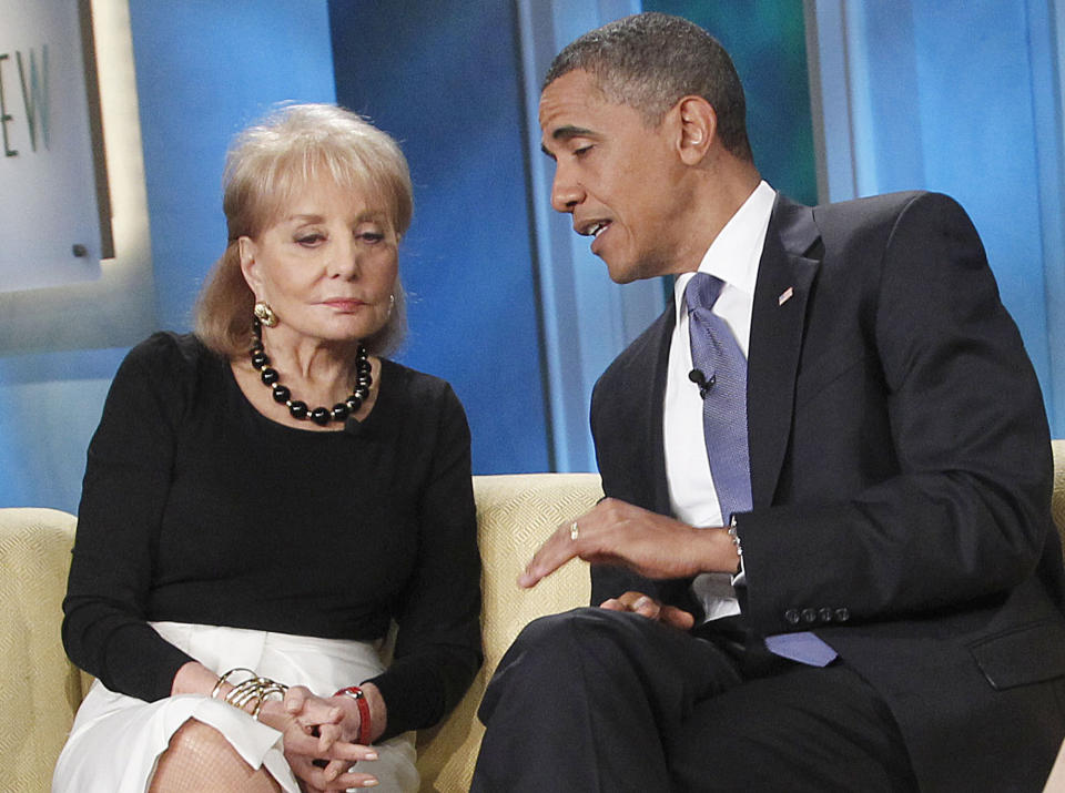 FILE - President Barack Obama speaks to Barbara Walters during his guest appearance on ABC's '"The View" on July 28, 2010, in New York. Walters, a superstar and pioneer in TV news, has died, according to ABC News on Friday, Dec. 30, 2022. She was 93. (AP Photo/Pablo Martinez Monsivais, File)