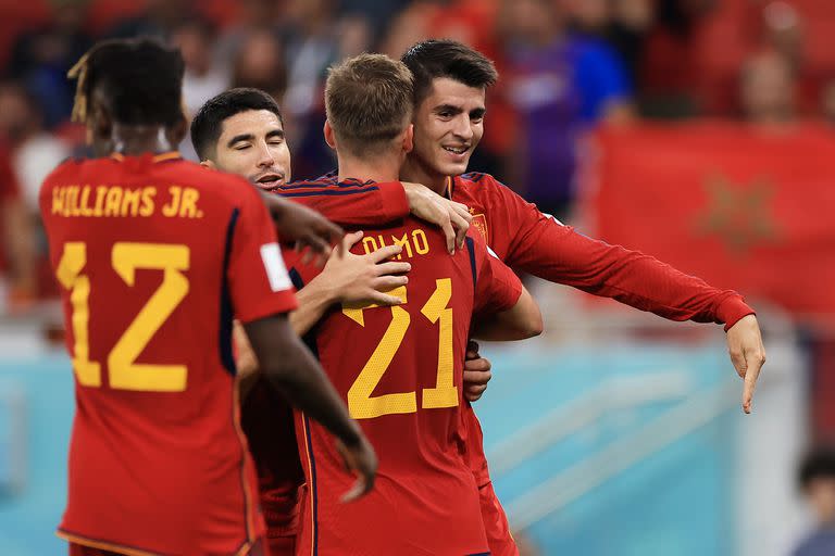 DOHA, QATAR - NOVEMBER 23: Alvaro Morata of Spain celebrates with Dani Olmo after scoring their team's seventh goal  during the FIFA World Cup Qatar 2022 Group E match between Spain and Costa Rica at Al Thumama Stadium on November 23, 2022 in Doha, Qatar. (Photo by Buda Mendes/Getty Images)