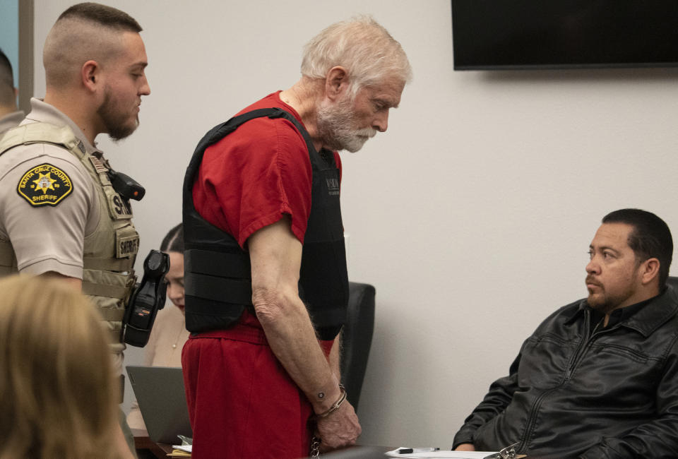 George Alan Kelly, center, enters court for his preliminary hearing in Nogales Justice Court in Nogales, Ariz., Wednesday, Feb. 22, 2023. Kelly, faces a first-degree murder charge in the fatal shooting of Gabriel Cuen-Butimea, who lived just south of the border in Nogales, Mexico. (Mark Henle/The Arizona Republic via AP, Pool)