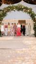 <p>Creative Director Virginie Viard recreated a summer village wedding in the Grand Palais for the SS21 Couture show. With Penélope Cruz, Marion Cotillard and Lily-Rose Depp as esteemed guests.</p><p>'I knew we couldn't organise a big show, that we would have to invent something else, so I came up with the idea of a small cortege that would come down the stairs of the Grand Palais and pass beneath arches of flowers. Like a family celebration, a wedding.' Viard said.</p><p>The simple, but no less moving set, feels somewhat fantastical in a year where <a href="https://www.elle.com/uk/fashion/celebrity-style/g30864/wedding-dress-inspiration-haute-couture-fashion-week/" rel="nofollow noopener" target="_blank" data-ylk="slk:weddings are limited;elm:context_link;itc:0;sec:content-canvas" class="link ">weddings are limited</a>, bringing hope to <a href="https://www.elle.com/uk/haute-couture-fashion-week/" rel="nofollow noopener" target="_blank" data-ylk="slk:Haute Couture fashion week;elm:context_link;itc:0;sec:content-canvas" class="link ">Haute Couture fashion week</a>. </p><p><a href="https://www.instagram.com/p/CKgjlq0ovZK/" rel="nofollow noopener" target="_blank" data-ylk="slk:See the original post on Instagram;elm:context_link;itc:0;sec:content-canvas" class="link ">See the original post on Instagram</a></p>