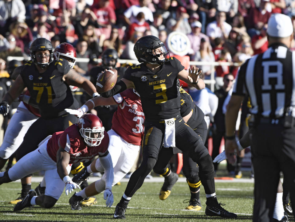 Missouri quarterback Drew Lock leads the nation in touchdown passes. (AP Photo/Michael Woods)