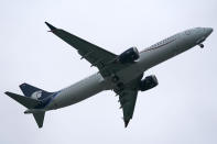 A Boeing 737 Max 9 built for Aeromexico flies after taking off from Renton Municipal Airport, Wednesday, Nov. 18, 2020, in Renton, Wash. After nearly two years and a pair of deadly crashes, the U.S. Federal Aviation Administration announced Wednesday that the 737 Max has been cleared for flight after regulators around the world grounded the Max in March 2019, after the crash of an Ethiopian Airlines jet. (AP Photo/Ted S. Warren)