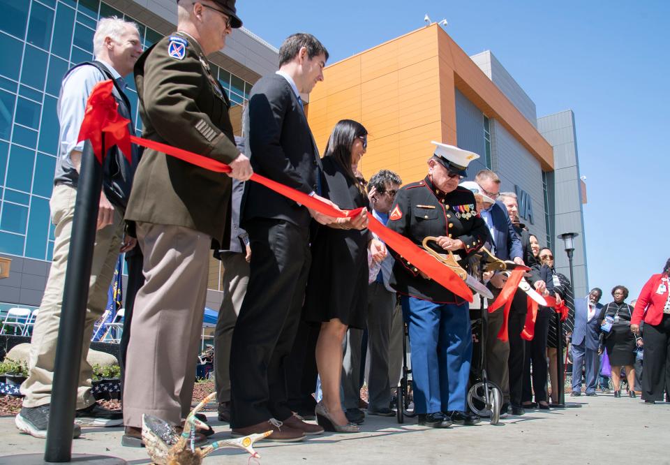 Dignitaries participate in a ribbon-cutting ceremony for the new Richard A. Pittman VA clinic in French Camp on Apr. 25, 2024.