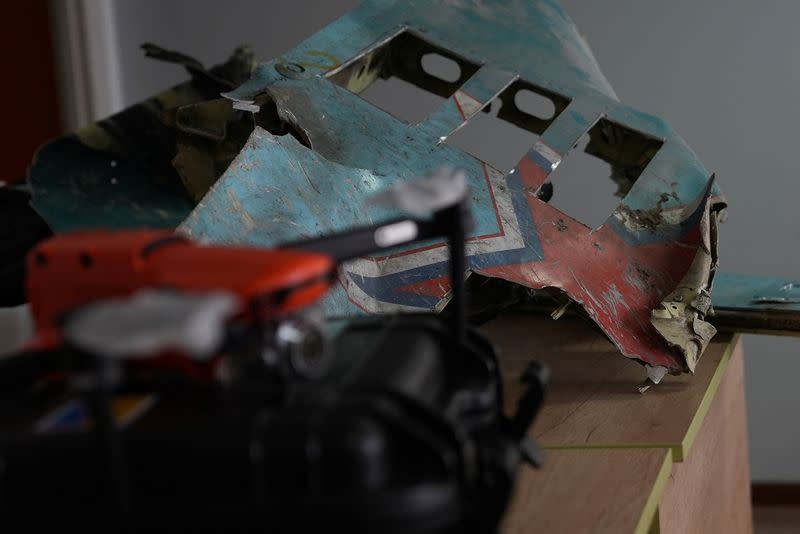 A Ukrainian startup under 'Made in Russia, recycled in Ukraine' campaign makes keychains from the skin of a Russian SU-34 wreck , in Kyiv