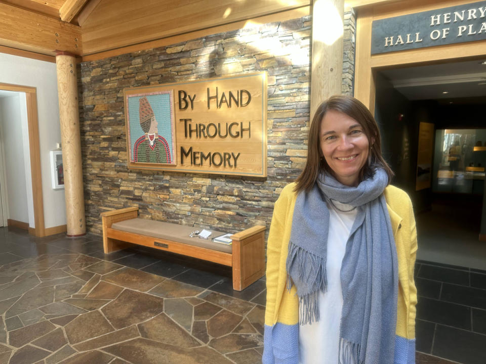 Dana Whitelaw, executive director of the High Desert Museum in Bend, Ore., stands outside the entrance of the exhibit “By Hand Through Memory” on Oct. 18, 2023. Museum staff plan to renovate the space with regional tribes.