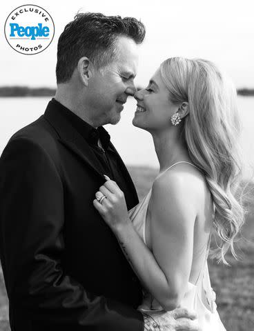 <p>Christy Dux Portraits</p> Gary Allan and wife Molly Martin embrace after their wedding