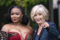 Yemi Alade, left, and Emma Thompson pose for photographers upon arrival at The Earthshot Prize Awards Ceremony, in London, Sunday, Oct. 17, 2021. (AP Photo/Scott Garfitt)