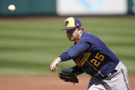 Milwaukee Brewers starting pitcher Brett Anderson throws during the first inning of a baseball game against the St. Louis Cardinals Sunday, April 11, 2021, in St. Louis. (AP Photo/Jeff Roberson)