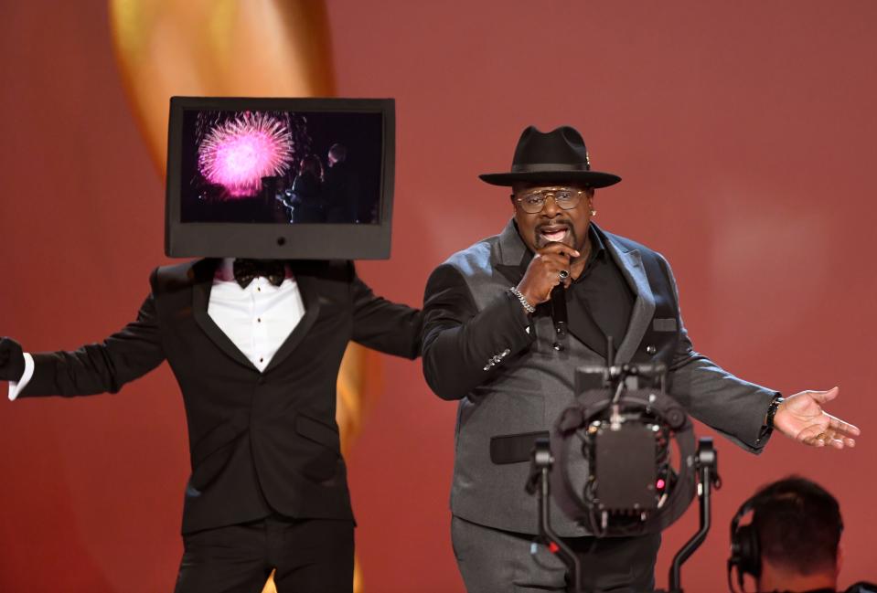 Host Cedric the Entertainer rapped as part of the Emmy Awards' opening number.