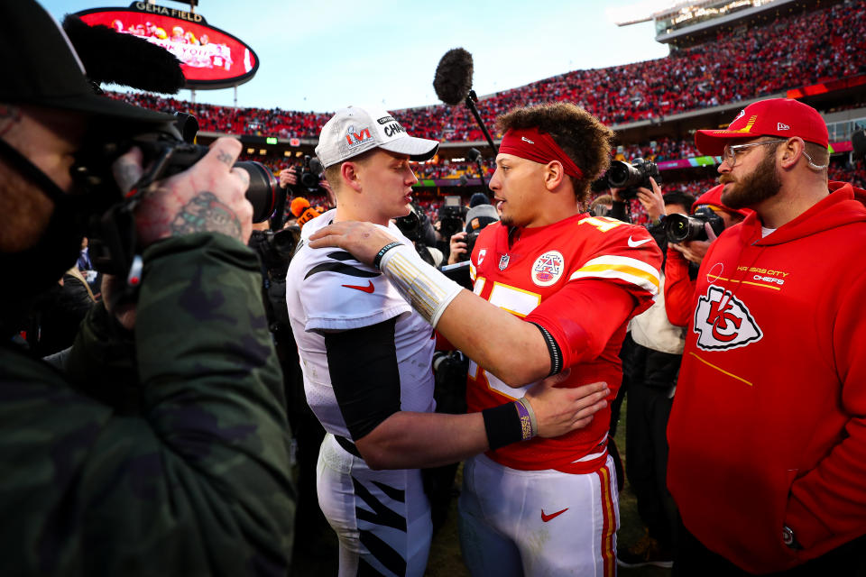 KANSAS CITY, MO - JANUARY 30: Joe Burrow #9 of the Cincinnati Bengals hugs Patrick Mahomes #15 of the Kansas City Chiefs after the AFC Championship Game at GEHA Field at Arrowhead Stadium on January 30, 2022 in Kansas City, Missouri. (Photo by Kevin Sabitus/Getty Images)