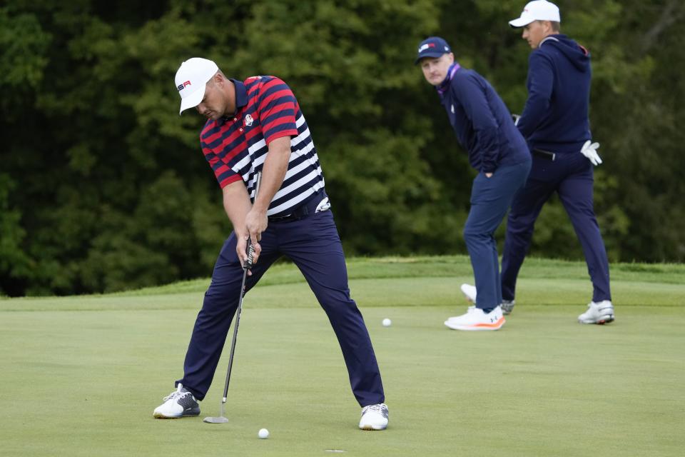 Team USA's Bryson DeChambeau putts on the ninth green during a practice day at the Ryder Cup at the Whistling Straits Golf Course Thursday, Sept. 23, 2021, in Sheboygan, Wis. (AP Photo/Ashley Landis)