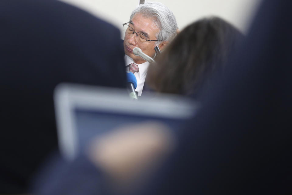 Junichiro Hironaka, a lawyer of former Nissan chairman Carlos Ghosn, attends a press conference in Tokyo, Thursday, Oct. 24, 2019. The lawyers of former Nissan Chairman Carlos Ghosn, who is awaiting trial in Japan, said Thursday they have requested that financial misconduct charges against him be dismissed. (AP Photo/Koji Sasahara)