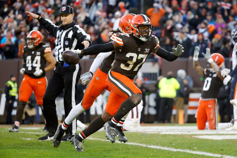 Browns safety D'Anthony Bell (37) reacts after intercepting a pass at the end of a win over the Bears, Sunday, Dec. 17, 2023, in Cleveland.