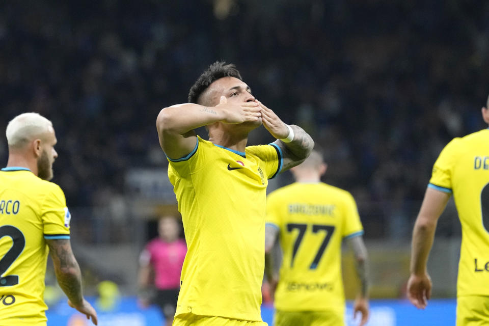 Inter Milan's Lautaro Martinez celebrates after scoring his side's third goal during the Serie A soccer match between Inter Milan and Sassuolo at the San Siro Stadium, in Milan, Italy, Saturday, May 13, 2023. (AP Photo/Antonio Calanni)