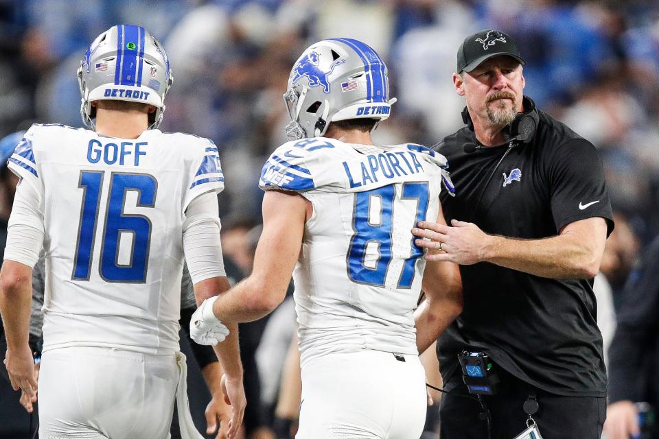 Lions coach Dan Campbell celebrates a touchdown against the Cowboys with tight end Sam LaPorta during the second half of the Lions' 20-19 loss at AT&T Stadium in Arlington, Texas on Saturday, Dec. 30, 2023.