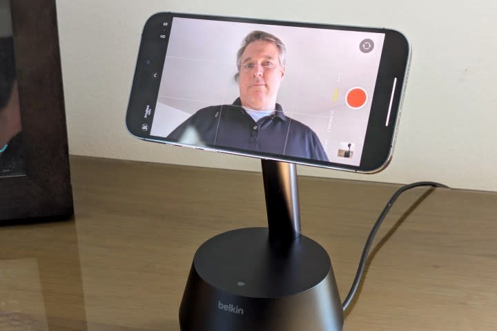 Belkin Stand Pro showing iPhone camera app with person being tracked.