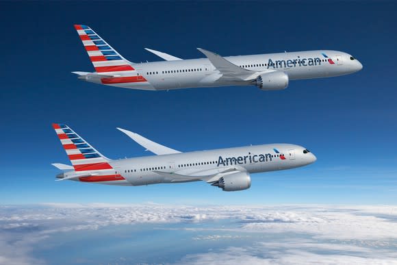 A rendering of a 787-8 and a 787-9 in American Airlines colors flying over clouds