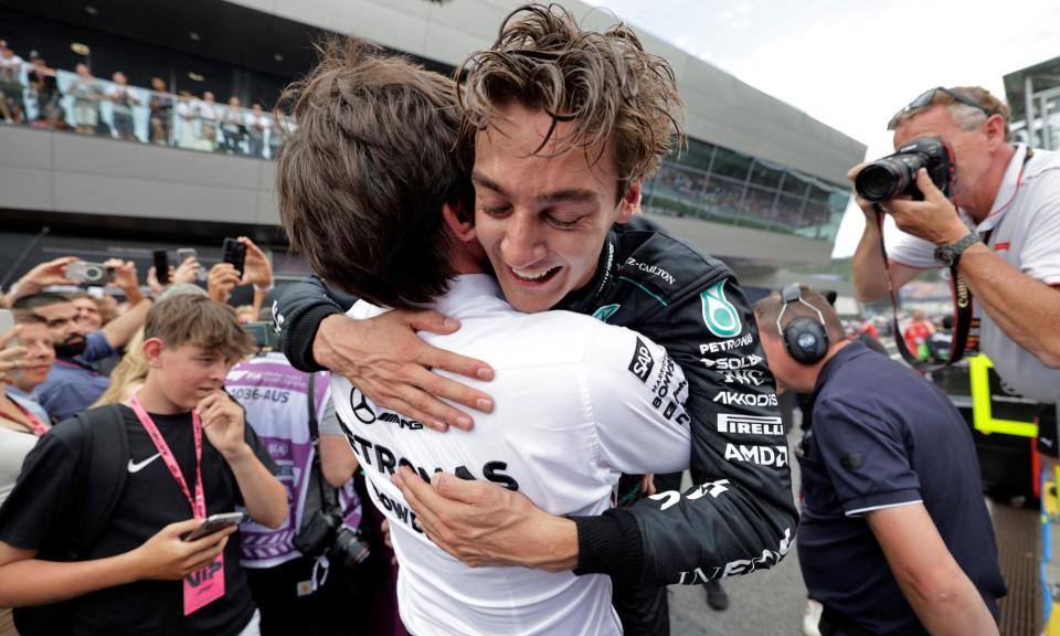 <span>George Russell hugs team principal Toto Wolff (in white) after Mercedes’ surprise victory in Austria.</span><span>Photograph: Leonhard Föger/Reuters</span>