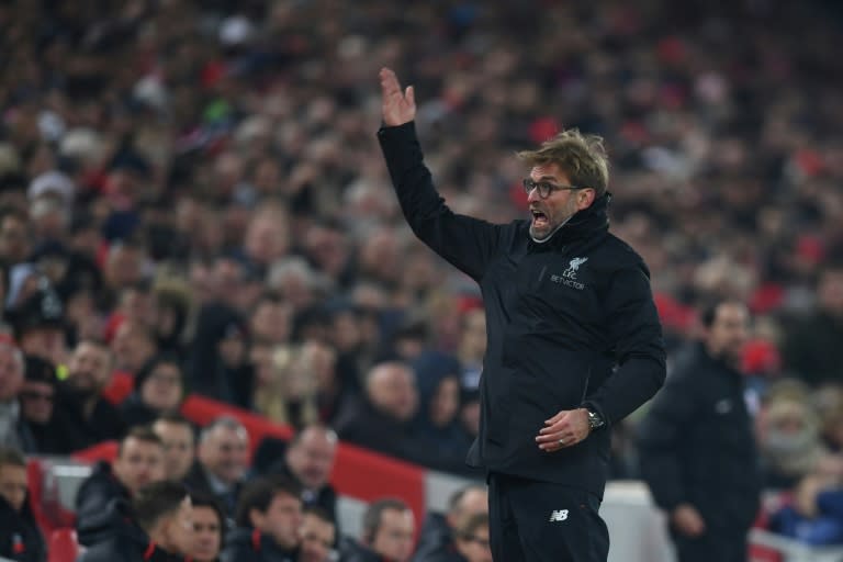 Liverpool's German manager Jurgen Klopp gestures and shouts at the crowd to get them to sing louder in support of his team during the English Premier League football match against Sunderland November 26, 2016