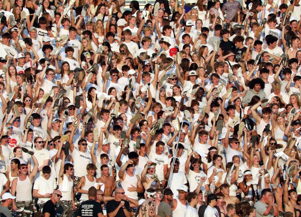 Ankeny Centennial fans cheer for the Jaguars in their game against Ankeny High on Friday, September 2, 2022, at Ankeny Stadium.