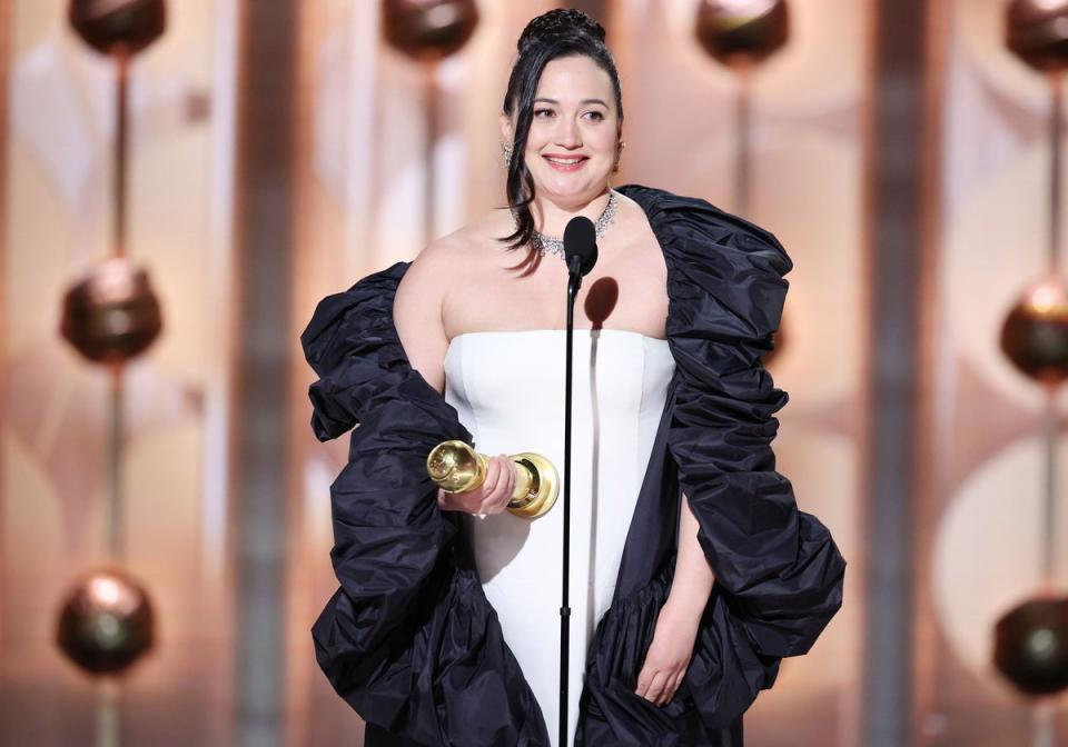 Lily Gladstone accepting her Golden Globe (Golden Globes 2024 via Getty Ima)