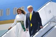 US President Donald Trump and First Lady Melania Trump disembark from Air Force One at Sardar Vallabhbhai Patel International Airport in Ahmedabad on February 24, 2020. (Photo by MANDEL NGAN / AFP) (Photo by MANDEL NGAN/AFP via Getty Images)