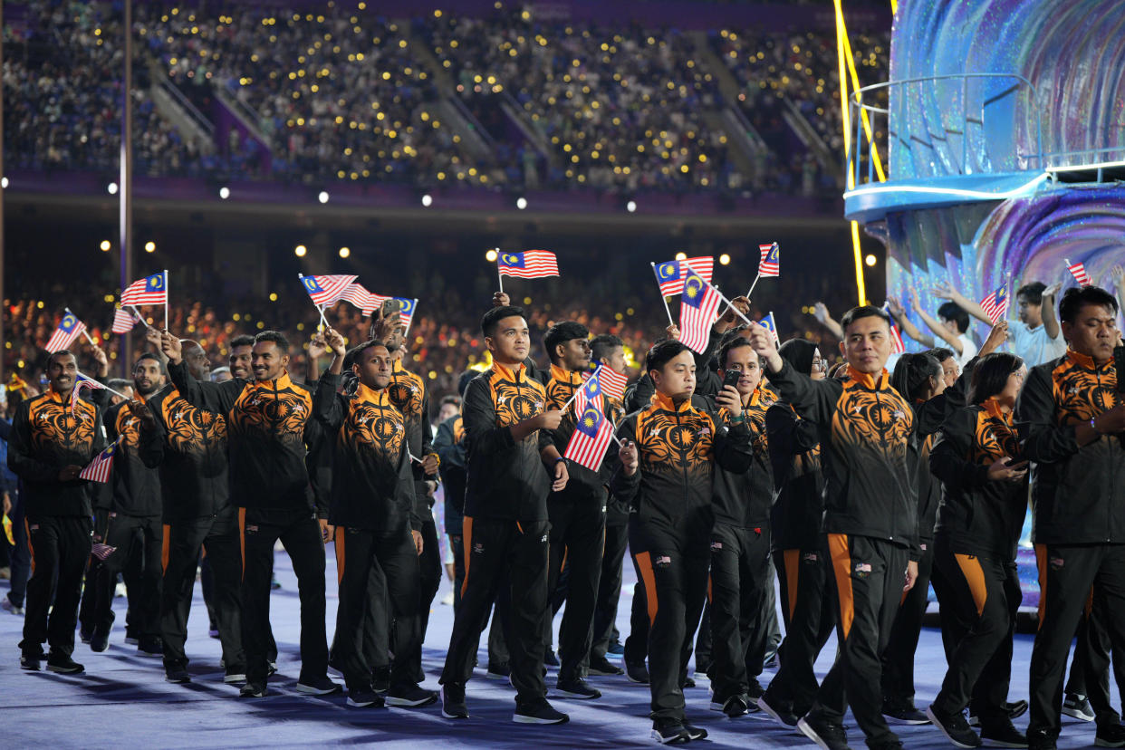 Malaysia athletes during the closing ceremony of the 2023 Hangzhou Asian Games.