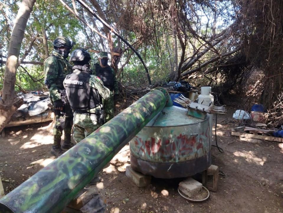 <div class="inline-image__caption"><p>Mexican Army personnel interact at a seized fentanyl pill manufacturing center and a methamphetamine lab, in Culiacan, in Sinaloa state, Mexico February 14, 2023.</p></div> <div class="inline-image__credit">Mexican Defense Ministry via Reuters</div>