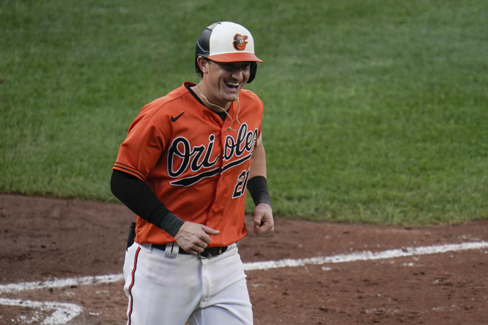 Baltimore Orioles' Austin Hays reacts after hitting a solo home run against the Toronto Blue Jays during the fourth inning of the first game of a baseball doubleheader, Saturday, Sept. 11, 2021, in Baltimore. (AP Photo/Julio Cortez)