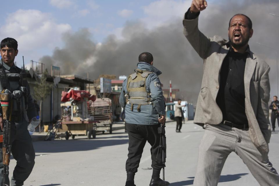 Afghan security forces respond to a suicide attack in Kabul, Afghanistan, Wednesday, March 1, 2017. A pair of suicide bombings, both claimed by the Taliban, struck the Afghan capital, an Afghan official said. (AP Photo/Rahmat Gul)