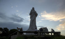 A Christ statue stands without tourists milling about, amid a lockdown affecting tourism to curb the spread of the COVID-19 pandemic in Havana, Cuba, Thursday, June 18, 2020. For state-run tourism, Cuba's success so far in controlling the coronavirus is becoming part of some companies' marketing plans. (AP Photo/Ismael Francisco)