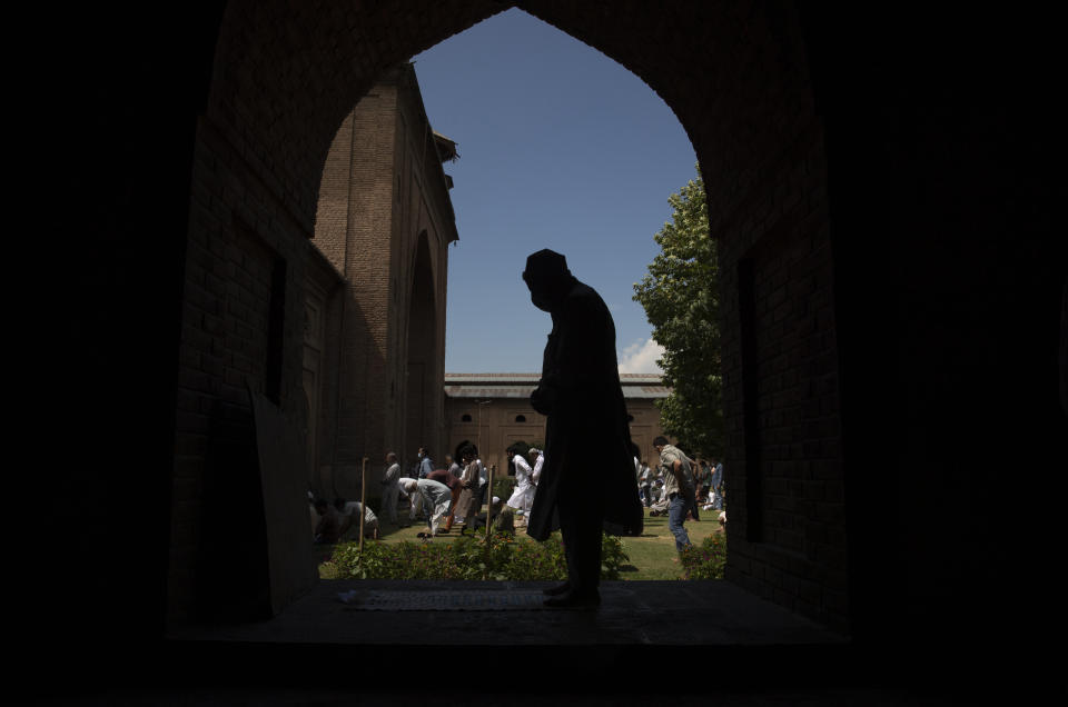 A Kashmiri prays inside Jamia Masjid, or Grand Mosque, in Srinagar, Indian Controlled Kashmir, Aug. 21, 2020. After the gap of almost 5 months Friday prayers were organized inside the Grand Mosque as shrines and other religious places across the Jammu and Kashmir reopened for devotees on Sunday after remaining closed due to the COVID-19 pandemic. (AP Photo/Dar Yasin)