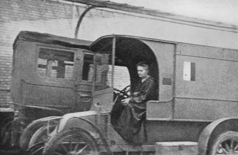 Marie Curie driving a mobile radiological van. (Getty)