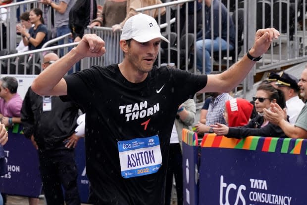 Ashton Kutcher at the 2022 NYC Marathon<p>TIMOTHY A. CLARY/AFP via Getty Images</p>