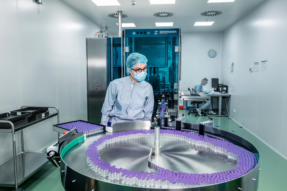 At the Baxter facility in Halle, 220 vials can be filled and capped every minute. Before they are labeled, the filled vials go through one final inspection.<span class="copyright">Luca Locatelli for TIME</span>