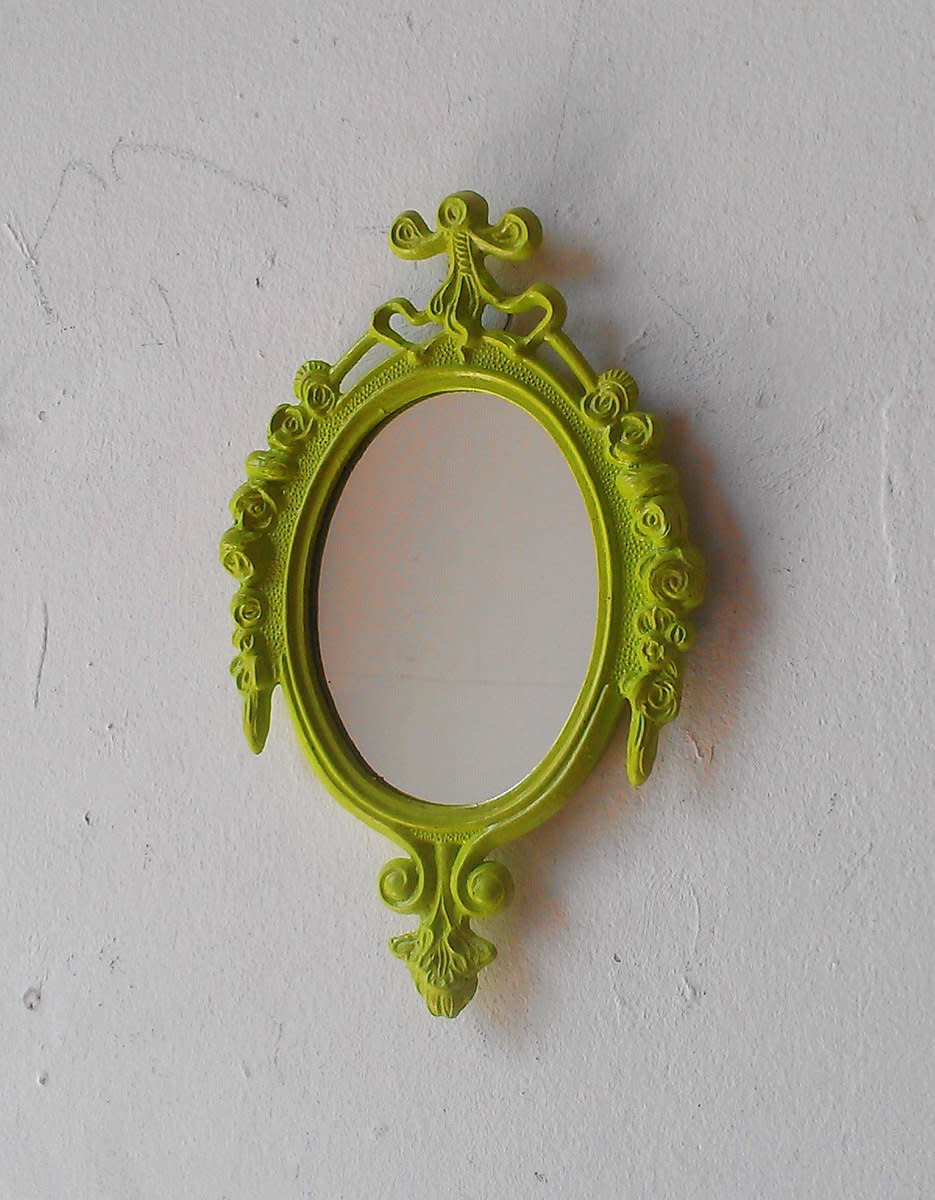 <a href="https://www.etsy.com/listing/180548298/small-mirror-in-vintage-spring-green?ga_order=most_relevant&amp;ga_search_type=all&amp;ga_view_type=gallery&amp;ga_search_query=green&amp;ref=sr_gallery_36" target="_blank">Shop it here for $23.</a>