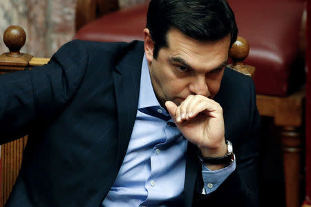 Greek Prime Minister Alexis Tsipras attends a parliamentary session before a vote on tax and pension reforms in Athens, Greece, May 8, 2016. REUTERS/Alkis Konstantinidis/File Photo