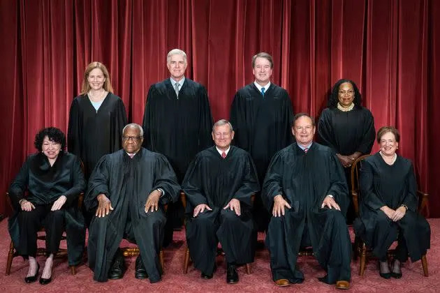 Supreme Court Justices Neil Gorsuch (standing second from the left) and Sonia Sotomayor (seated furthest left) are the only justices known to support overturning the Insular Cases. (Photo: Jabin Botsford/The Washington Post via Getty Images)