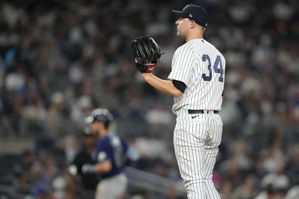 New York Yankees relief pitcher Michael King (34) waits as Tampa Bay Rays' Josh Lowe runs the bases after hitting a three-run home run during the eighth inning of a baseball game Friday, May 12, 2023, in New York. (AP Photo/Frank Franklin II)