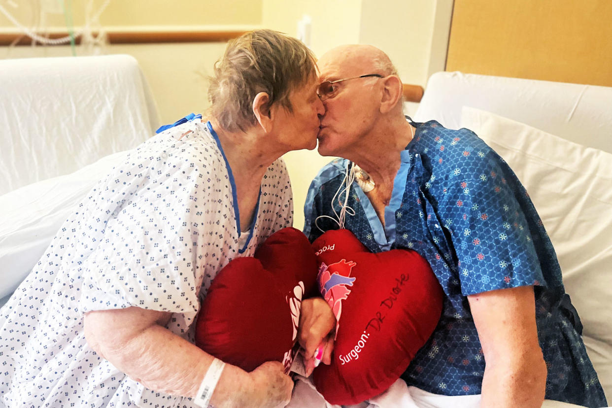 Margaret and Phil Vaske kiss in a hospital room. (HCA Healthcare)