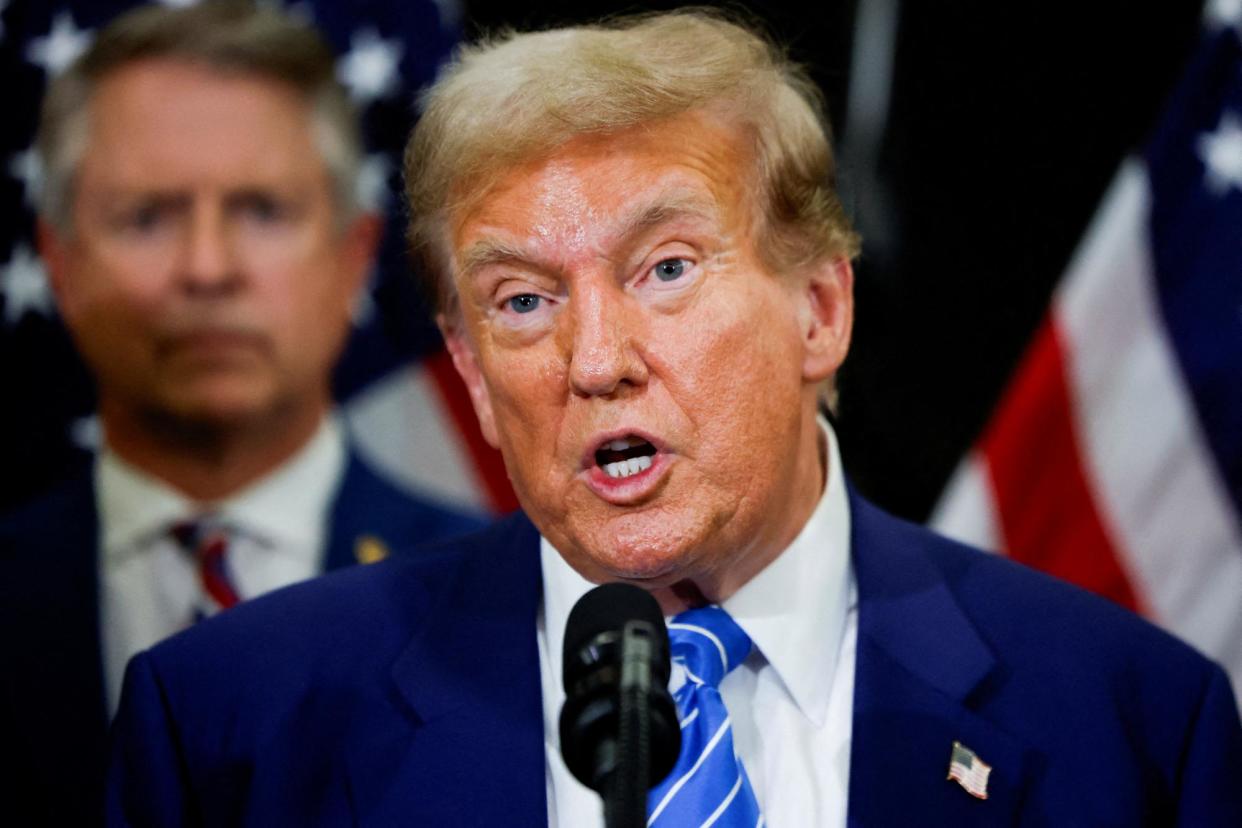 <span>Donald Trump speaks at the National Republican Senatorial Committee headquarters in Washington DC on Thursday.</span><span>Photograph: Evelyn Hockstein/Reuters</span>