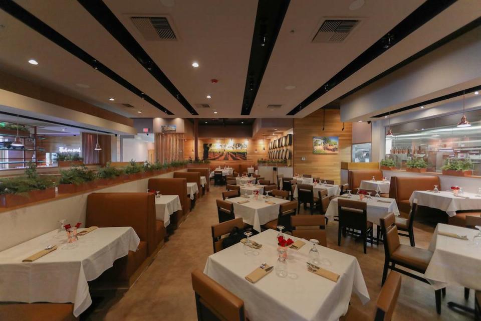 The dining room at the new Chef Adrianne’s looks into an open kitchen.