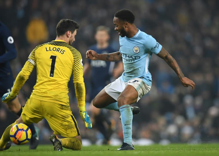Manchester City's Raheem Sterling (R) completed a brace of goals as City beat Tottenham Hotspur 4-1 to register a record-extending 16th successive Premier League win