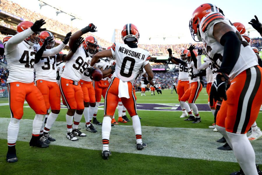 BALTIMORE, MARYLAND – NOVEMBER 12: Greg Newsome II #0 of the Cleveland Browns celebrates a touchdown with teammates against the Baltimore Ravens during the fourth quarter at M&T Bank Stadium on November 12, 2023 in Baltimore, Maryland. (Photo by Scott Taetsch/Getty Images)