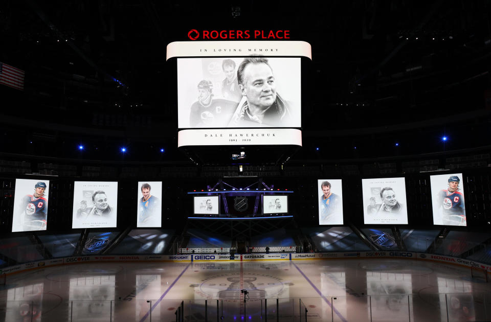 EDMONTON, ALBERTA - AUGUST 18: The center hung and arena screens honors former NHL Hall of Fame member Dale Hawerchuk prior to the the start of Game Five of the Western Conference First Round of the 2020 NHL Stanley Cup Playoff between the Dallas Stars and the Calgary Flames at Rogers Place on August 18, 2020 in Edmonton, Alberta. (Photo by Dave Sandford/NHLI via Getty Images)