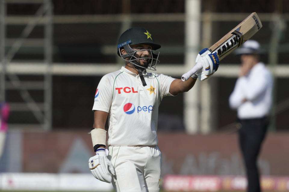 Pakistan's Saud Shakeel celebrates after scoring 100 runs during the third day of the second test cricket match between Pakistan and New Zealand, in Karachi, Pakistan, Wednesday, Jan. 4, 2023. (AP Photo/Fareed Khan)